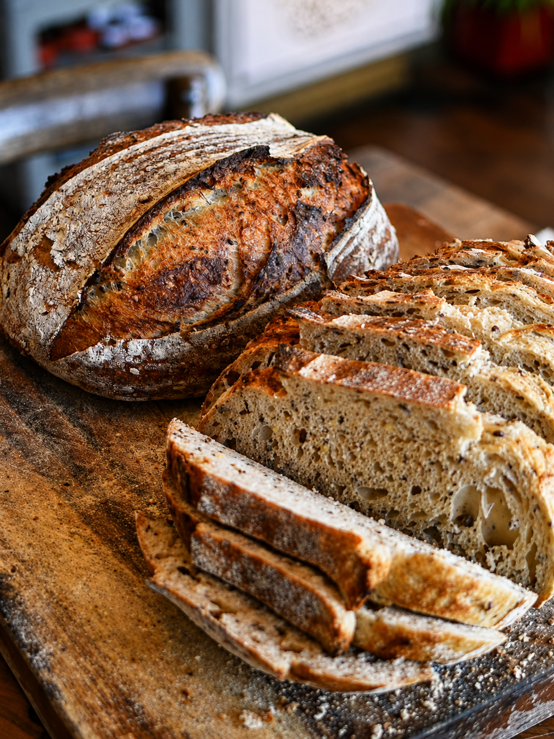 Freshly baked loaves and sliced bread